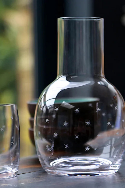A Crystal Carafe Set with Stars Design